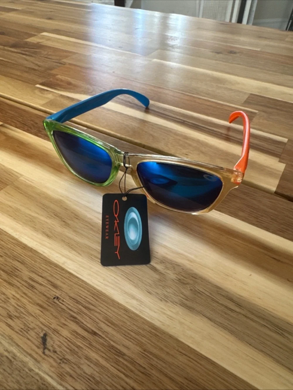 2 Oakley style kids Sunglasses polarized lenses. Not sure if authentic NWT